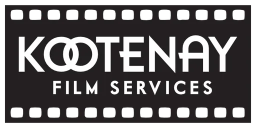 Kootenay Film Services logo: the words Kootenay Film Services in white on a black strip of film with sprocket holes along the top and bottom