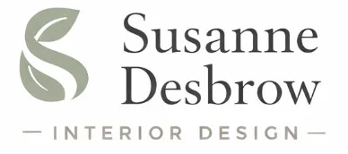 Susanne Desbrow Interior Design logo: a sage green leaf shape beside the name in dark grey, above the words Interior Design